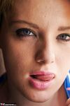 Big chubby JessicasHoneyz bends for naked upskirt & offers up huge big tits