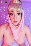 Busty amateur Kayla Kiss strips off her I Dream of Jeannie outfit in bedroom