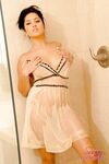 Solo model Sunny LeoneSunny Leone slips out her lingerie and panties in shower