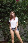 First timer Marina Rossi reveals her big naturals and juicy ass in the yard