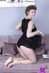 Curly haired amateur Philippa removes her sheer robe and flaunts her bush