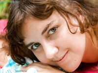 Petite amateur Marla strips naked outdoors to pleasure hairy vagina
