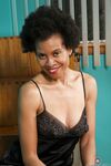Mature ebony mom Ariela removes sexy camisole & spreads her hairy beaver