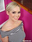 Blonde with a pretty face and big boobs Abbey Brooks jerks off a POV cock