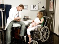 Wheelchair bound Megan Reece giving doctor footjob after cunnilingus