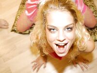 Blonde slut Angelz Silky swallows cum while sucking cocks during a gangbang