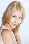 Lovely Euro chick Genevieve Gandi likes showing off her shaved pussy