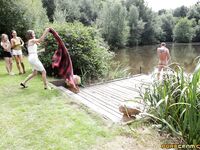 Three hotties please a horny voyeur by the side of a private lake