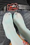Hungarian hottie Kitty Cat gets her stockings stripped before giving a footjob