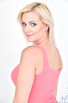 Blonde housewife Kirsten Klark slowly stips off the show shaved pussy close up