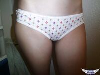 Young amateur girl takes selfies while exposing her small boobs and snatch