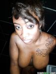 Curvaceous ebony lassie Serenity Red undressing and picturing herself