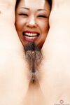 LBFM Saya Song parts her trimmed muff before pissing on stone pathway