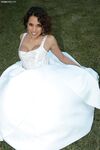 Latina bride Renae Cruz hikes her wedding dress to masturbate on the lawn