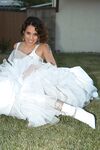 Latina bride Renae Cruz hikes her wedding dress to masturbate on the lawn