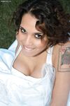 Latina bride Renae Cruz hikes her wedding dress to masturbate on the lawn