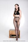 Tall teen Suzanna A removes crotchless pantyhose for a nude modelling gig