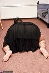 SSBBW wears a mask while unveiling her huge saggy tits and massive ass