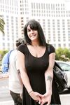 Amateur MILF in a hot dress Taylor teases with her big cleavage in public