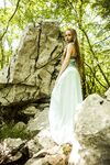 Teen princess in long dress Milena D teases with her hairy pussy in the woods