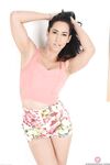 Close up photos of MILF Isis Love taking a piss after undressing