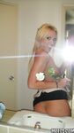 Playful blonde babe with small perky tits picturing herself