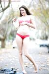 Adorable brunette babe Darya showing off her hairy cunt outdoors