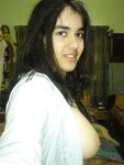 Indian girl takes self shots with big natural tits free of blouse