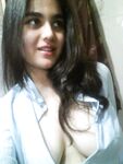 Indian girl takes self shots with big natural tits free of blouse
