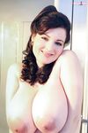 Big-tit babe Lorna Morgan undressing and showing off her body