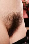Amateur honey Briar Rose reveals her hot butt and bushy twat in the kitchen
