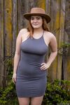 Sexy clothed Dallin Thorn lifts her tight dress to show her plump round ass