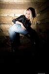Hot blonde Dannii Harwood works her big tits clear of leather jacket