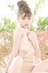 Adorable teen Sowan unveils her small titties and cute small cunt outdoors