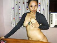 Fat Indian chick flaunts her big boobs during a live webcam show