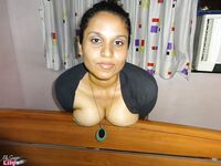 Fat Indian chick flaunts her big boobs during a live webcam show