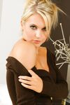 Foxy Kayleigh Pearson strips off dress and shows assets in pantyhose & panties