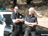 Blonde Spanish copper Bridgette B fucks a hot criminal on the cop car