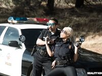 Blonde Spanish copper Bridgette B fucks a hot criminal on the cop car