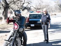 Blonde Spanish copper Bridgette B fucks a hot criminal on the cop car