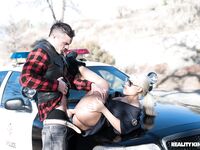 Blonde Spanish copper Bridgette B fucks a hot criminal on the cop car