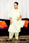 Older mature Indian Kira B modelling her sexy legs non nude in sandals