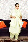 Older mature Indian Kira B modelling her sexy legs non nude in sandals