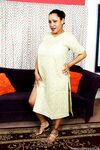 Older mature Indian Kira B modelling her sexy legs non nude in sandals