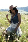 Sultry country girl Angel Constance flashes natural tits & hard nips outdoors