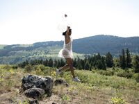 Sultry country girl Angel Constance flashes natural tits & hard nips outdoors