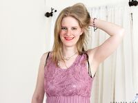 Mature MILF Chelsea Carter removes a crotchless bodystocking before dildoing