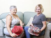 Two old lesbians exposes their big boobs and bare asses together