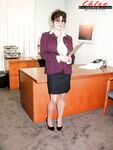 French babe Chloe Vevrier freeing huge boobs in hose on secretary's desk