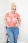 Thick blonde chick Bailey Martin uncovers her large tits and ass as she strips